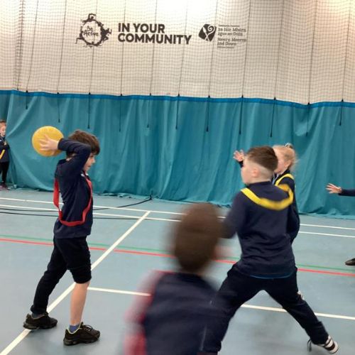 Ball Games: Lesson 2 - Passing the ball to someone in a space.