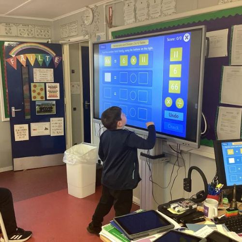 Learning to check answers using multiplication and division fact families