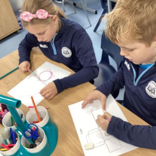 Building 3D shapes using nets. We had to build a range of shapes and then look at new words like faces, vertices and edges.