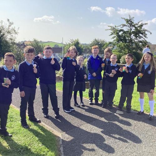 Enjoying our slushies and ice cream in the sunshine.